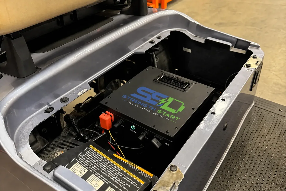 JK BMS 0.4–1A balancing BMS installed under a golf cart seat